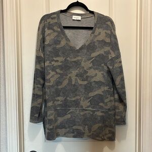 Camo Top by Story size medium but fits like a large.